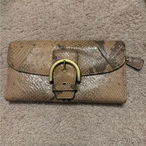 Coach tan snake print large wallet.